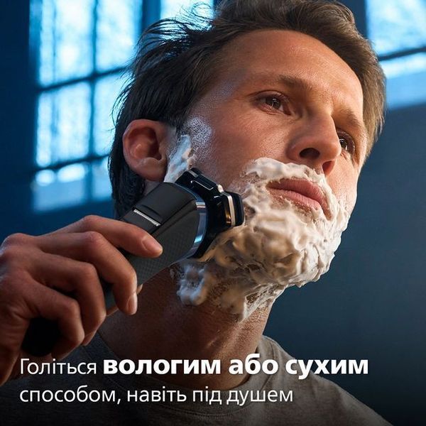 Бритва електр. Philips роторна Series 7000, 9Вт, бритв.головок-3, Li-Ion, сух.+волог., тример, чохол, Bt., сіро-синій (S7882/55) 363452 фото