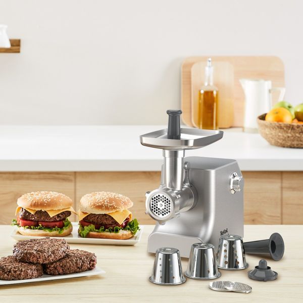 М'ясорубка Tefal HV10 8in1, 2200Вт, 5.5кг/хв, 3 решітки, насадка для ковбас, кеббе, 3 терки, метал (NE858D38) 370723 фото