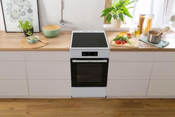 Плита Gorenje електрична індукційна, 70л, 50x60см, дисплей, програматор IconLed, поєднання конфорок, білий (GEIT5C60WPG) 375605 фото