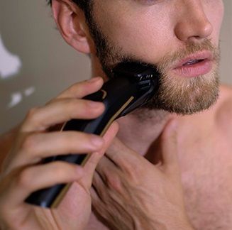 Машинка для стриження Babyliss, мережа+акум., вібраційний мотор, насадок-1, сталь, чорно-коричневий (E974E) 366417 фото