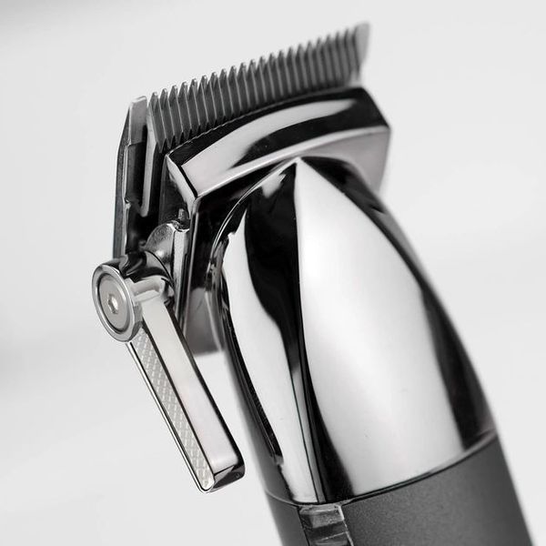 Машинка для стриження Babyliss, мережа+акум., вібраційний мотор, насадок-10, кейс, чохол, гребінець у компл., сталь, сірий (E996E) 366418 фото
