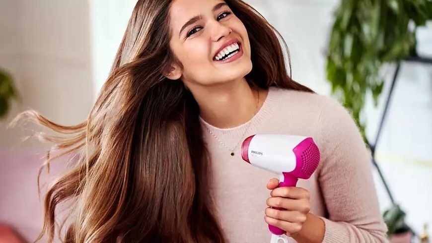 Фен Philips DryCare Essential дорожній, 1400Вт, 2 режими, хол. обдув, рожевий (BHD003/00) 371117 фото