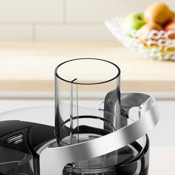 Соковитискач Tefal Nutri XXL відцентрований 1000Вт, чаша-0.8л, жмих-2.2л, жолоб на ціле яблуко, пластик/метал, чорний-нержавіюча сталь (ZE660D10) 369475 фото