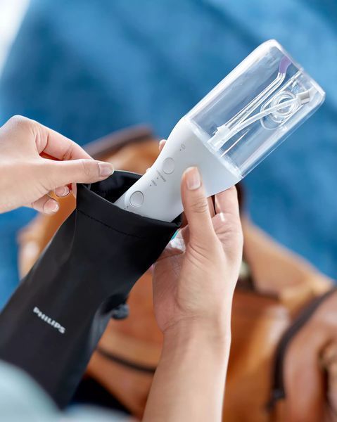Іригатор Philips портативний Sonicare Cordless Power Flosser 3000, чаша 250 мл, чохол, 2 насадки , білий (HX3826/31) 371235 фото