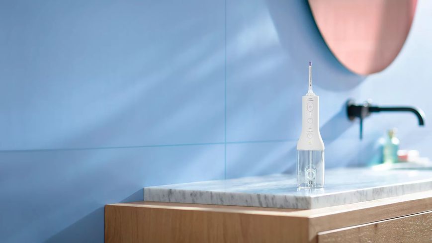 Іригатор Philips портативний Sonicare Cordless Power Flosser 3000, чаша 250 мл, чохол, 2 насадки , білий (HX3826/31) 371235 фото