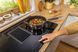 Варильна повверхня Gorenje індукційна, 83см, розширена зона, вбудована витяжка, 620м.куб/год, чорний (HET949BSC) 367502 фото 12