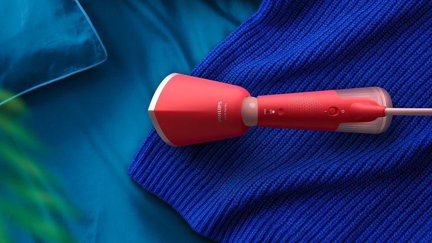 Відпарювач Philips компактний Series 5000, 1400Вт, 120мл, паровий удар -24гр, складана ручка, чохол-рукавичка, пластик, червоний (STH5020/40) 375023 фото
