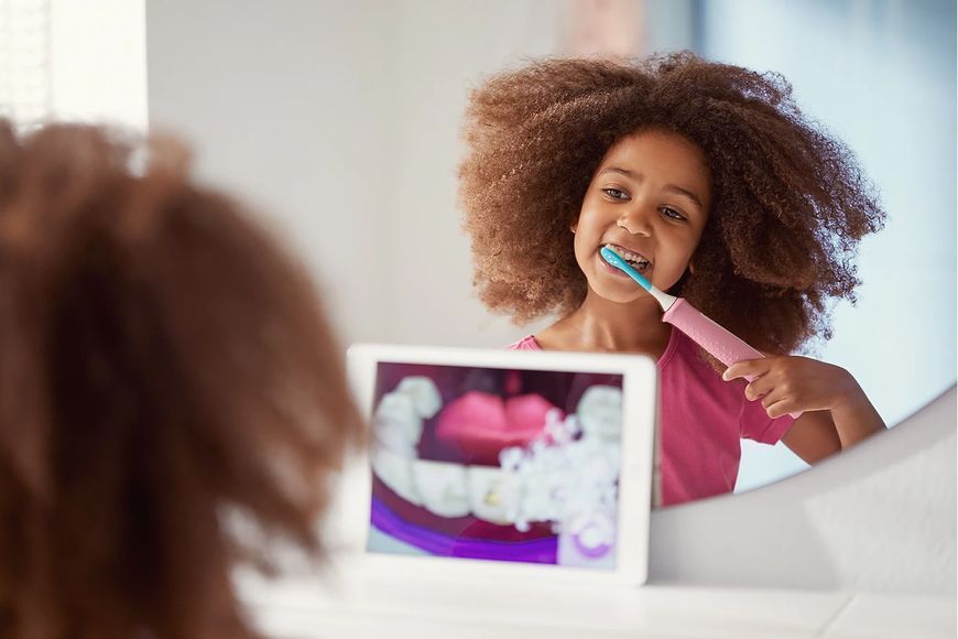 Зубна електрощітка PHILIPS HX6352/42 Kids Smart Pink 297990 фото