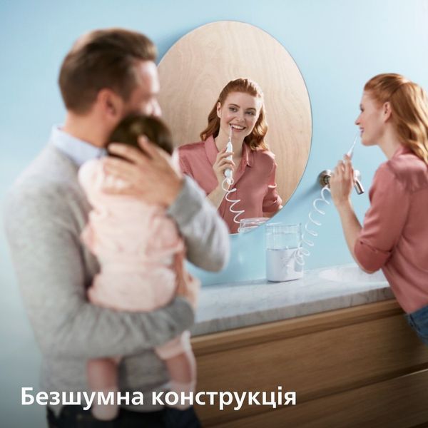 Іригатор Philips стаціонарний Sonicare Philips Sonicare Power Flosser 7000, чаша 600 мл, від мережі , чохол, 4 насадки , білий (HX3911/40) 367582 фото