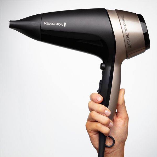 Фен Remington Thermacare Pro, 2100Вт, 3 режими, дифузор,турмалінова іоніз-я, хол. обдув, чорно-коричневий (D5715) 373062 фото
