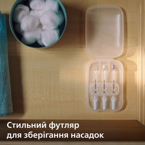 Іригатор Philips стаціонарний Sonicare Philips Sonicare Power Flosser 7000, чаша 600 мл, від мережі , чохол, 4 насадки , білий (HX3911/40) 367582 фото