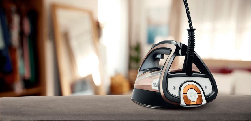 Праска Tefal Ultimate Pure, 3200Вт, 350мл, паровий удар -260гр, постійна пара - 60гр, керам. підошва, чорно-рожевий (FV9845E0) 374402 фото